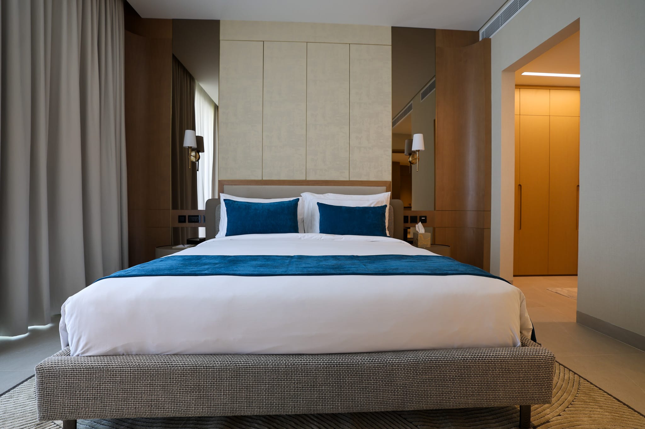 Upholstered headboard & panelled joinery